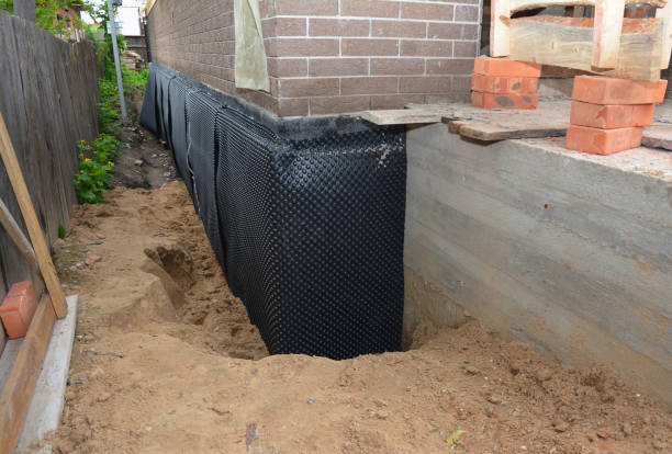 Happy homeowners after waterproofing job in Bradley Beach
